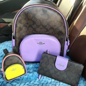 Coach backpack, wallet, and mini backpack accessory